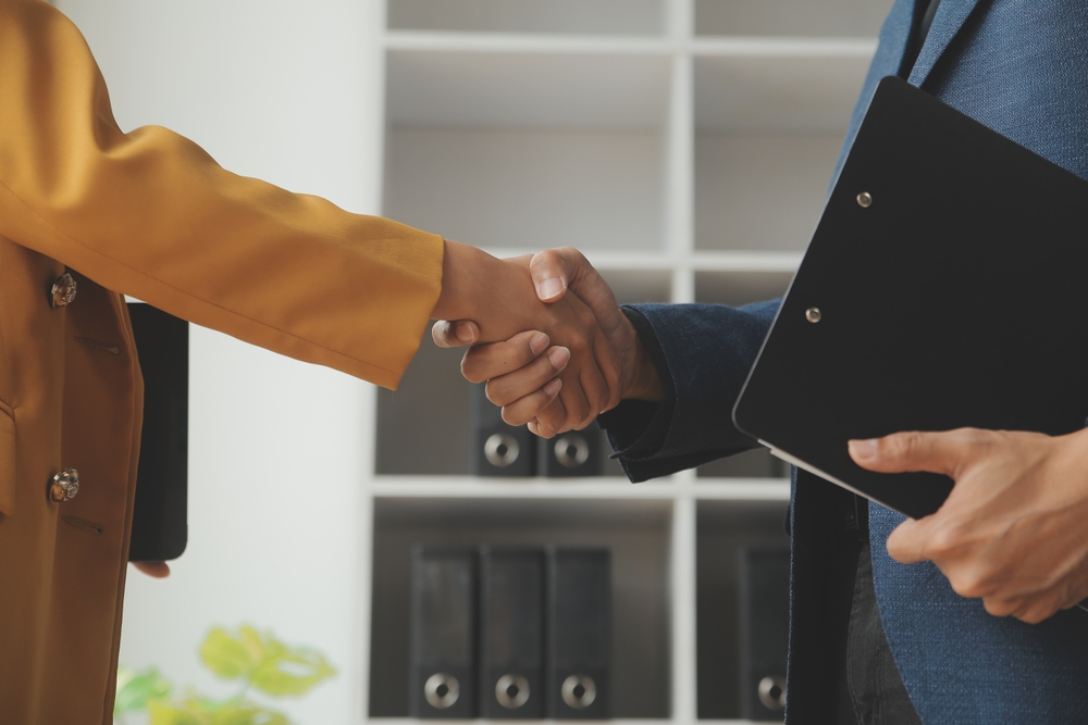 Business,Woman,Offer,And,Give,Hand,For,Handshake,In,Office.