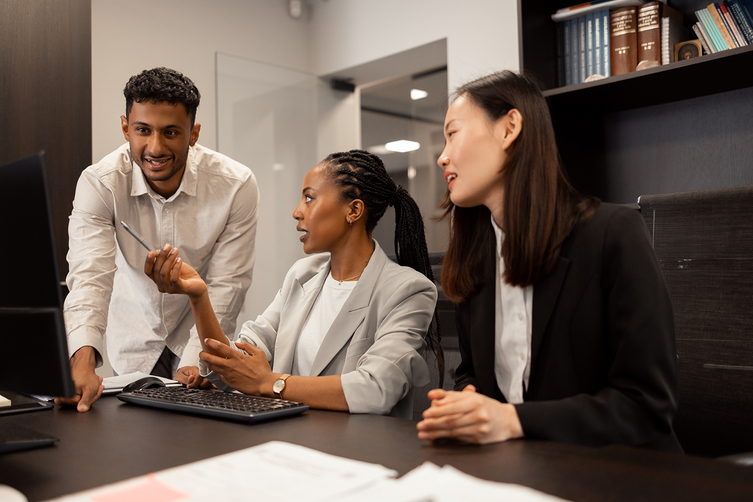 people at the office discussing 